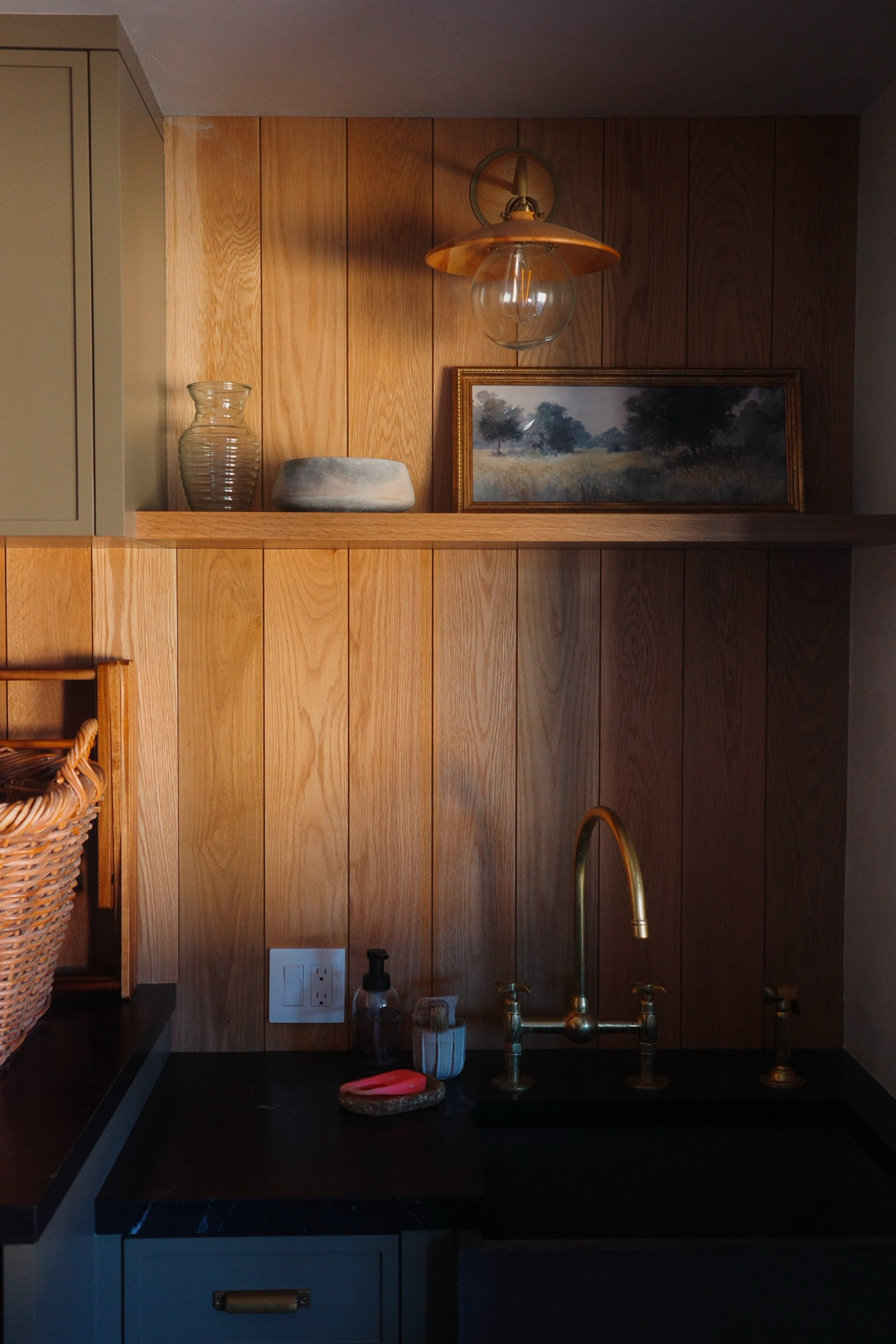 Wood-paneled utility sink at Hope Ranch